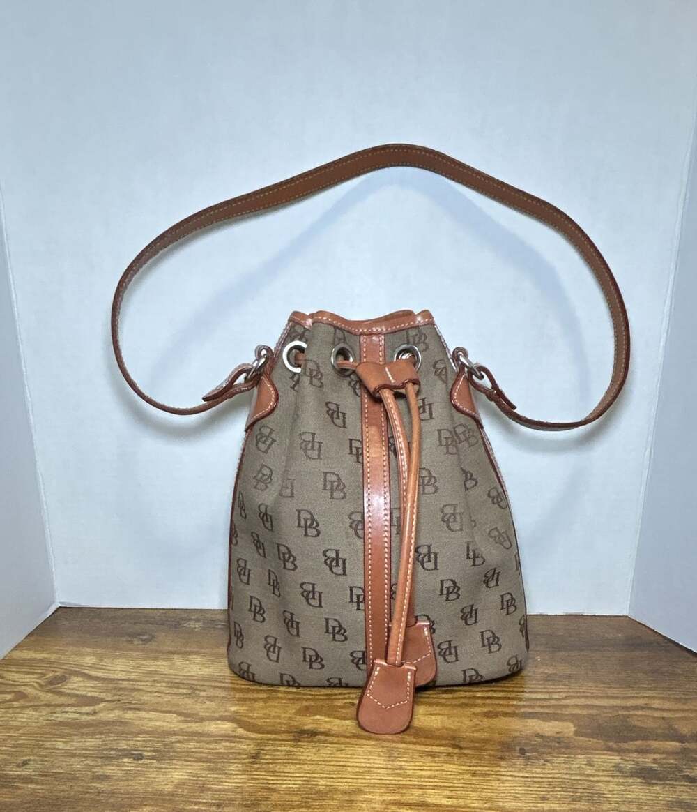 Dooney & Bourke Monogram Drawstring Bucket Bag Brown Canvas 9" x 8.5"
